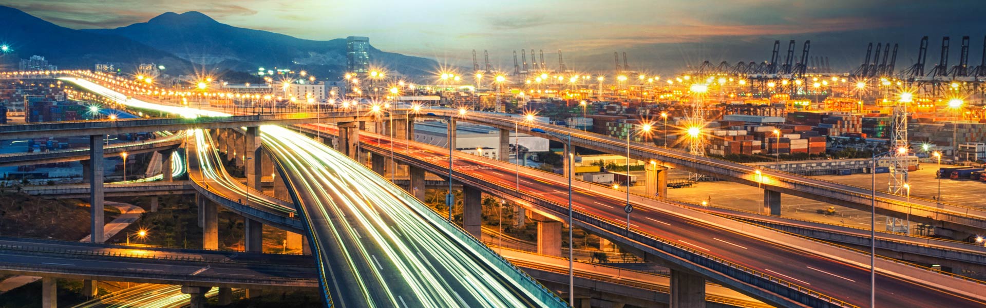 background of lights speeding through highway roads