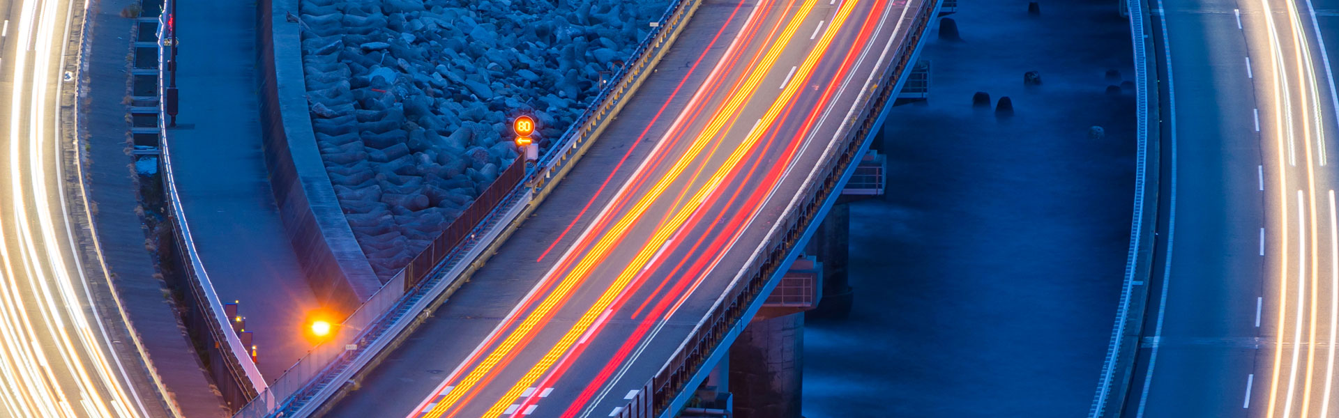 background of lights running through highway