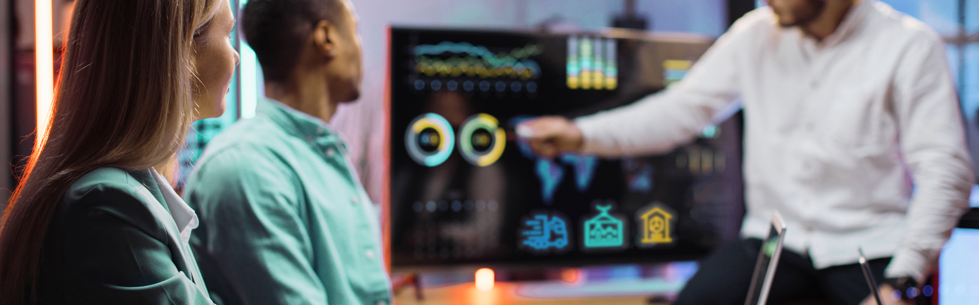 man pointing to graphs